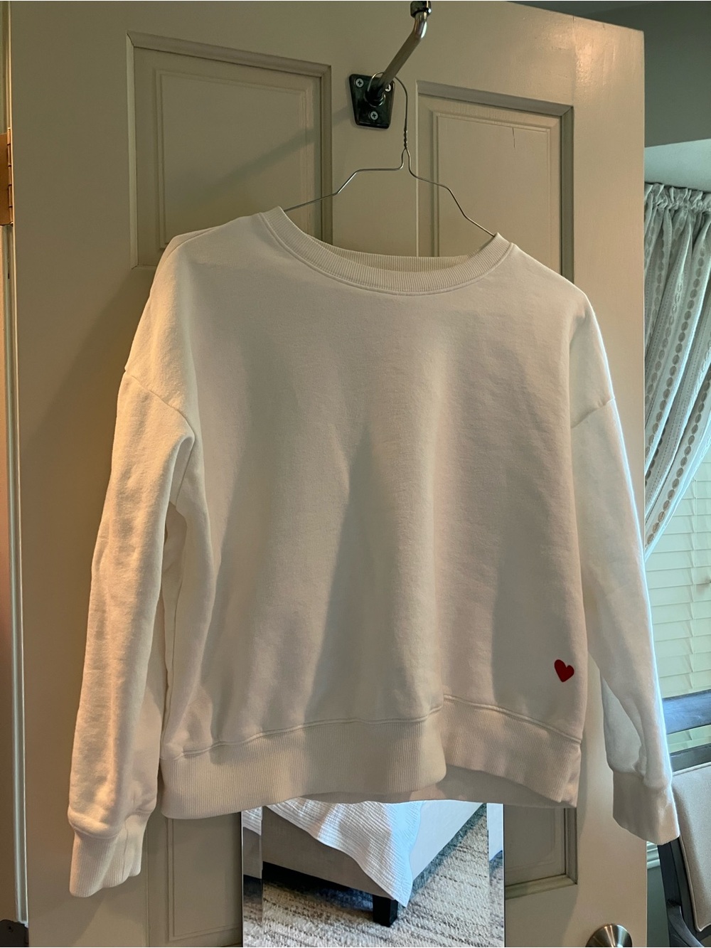 Women's White Crewneck Sweater with Small Red Heart Accent